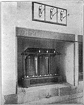 FIG. 22.  FIVE-THOUSAND-KILOVOLT-AMPERE, OPEN-TYPE, AIR-COOLED TRANSFORMER AT LOMAZZO.