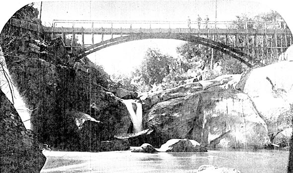 FIGURE. 2  ARCH FLUME STRUCTURE OVER THE NORTH FORK OF THE SAN JOAQUIN RIVER, SHOWING CONFLUENCE OF THE DIVERSION FLUME INTO THE MAIN FLUME.