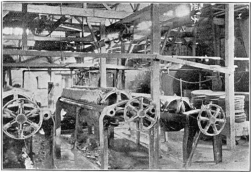 HIGH-TENSION INSULATORS  FILTER PRESSES AND BALL MILLS, SHOWING "LEAVES" OF CLAY AT RIGHT.