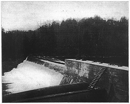 FIG. 7.  VIEW OF DAM FROM FOREBAY END.