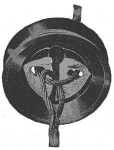 FIG. 2. LOOP OF TIE WIRES INTERMESHED IN A BROKEN INSULATOR.