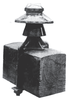 FIG. 6.  THE INSULATORS WERE MANUFACTURED BY THE R. THOMAS & SONS COMPANY.  THE PINS ARE CLAMPED TO THE CROSS-ARMS, AS SHOWN HERE.