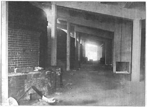 Fig. 32. Kilns, with concrete coal chutes between.