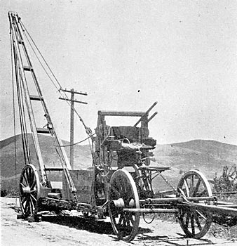 THE LOW, FOUR-WHEELED TRUCK DERRICK.