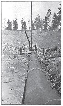 FIG. 10. — A PART OF THE FOREBAY DAM, SHOWING THE STANDPIPE.