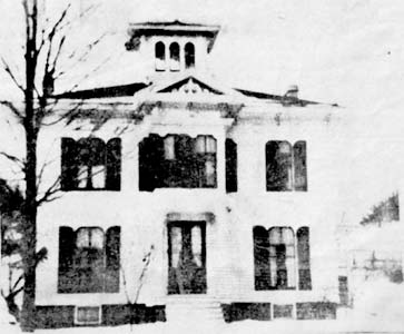 OLD LOCKE HOUSE — This photo of what is presently the residence of the Jake Garvey family, was taken around 1900.  Shows the house as it looked before the wing containing the laboratory was added by Fred M. Locke, founder of Victor Insulators.
