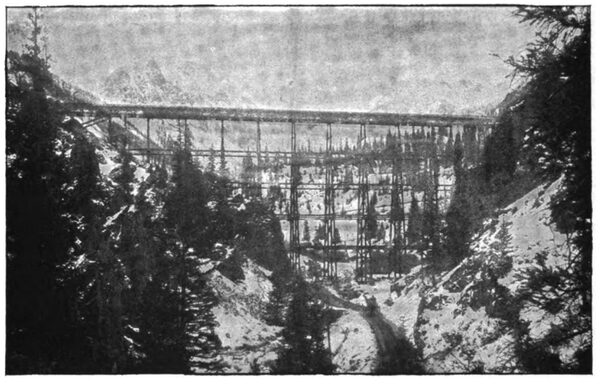 FIG. 1.  FLUME AND TRESTLE, SILVER LAKE MINES, COL., THREE-PHASE TRANSMISSION PLANT.