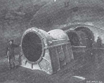 CASINGS FOR FOUR TURBINES IN PLACE IN FLUME.