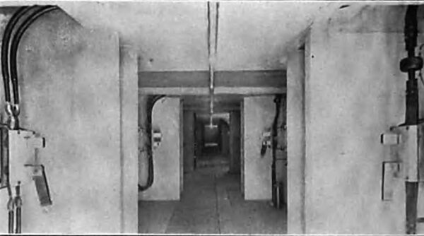 LONGITUDINAL VIEW OF THE NORTH SIDE OF THE SECOND FLOOR OF THE CONCRETE SWITCH HOUSE, SHOWING THE 2300- VOLT DISCONNECTING SWITCHES PLACED BELOW OIL SWITCH ROOM. NOTE THE BARRIERS BETWEEN DISCONNECTING SWITCHES.