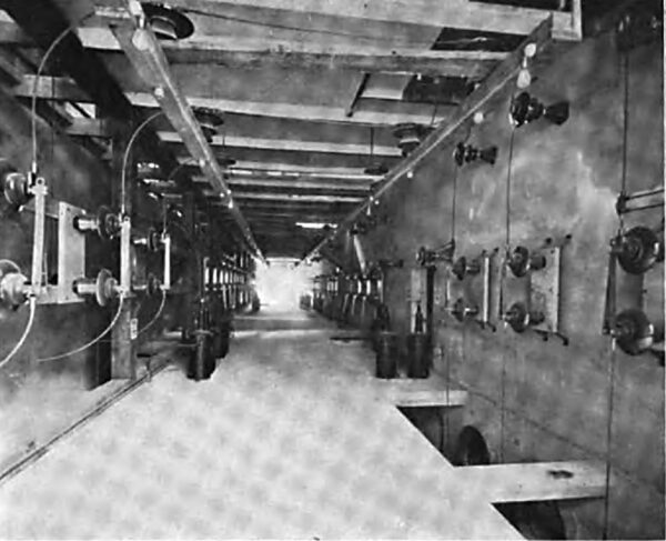 LONGITUDINAL VIEW ON THE FOURTH FLOOR OF THE CONCRETE SWITCH HOUSE AND SHOWING THE CURRENT TRANSFORMERS FOR INSTRUMENTS AND THE HIGH TENSION DISCONNECTING SWITCHES FOR ISOLATING THE OIL SWITCHES ON THE FLOOR ABOVE.
