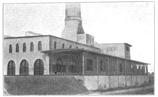 EXTERIOR VIEW OF POWER HOUSE SHOWING COAL STORAGE.