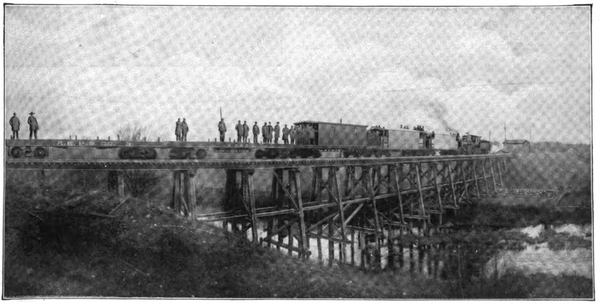 THE OPENING EXCURSION � ON LOOKING GLASS RIVER BRIDGE.