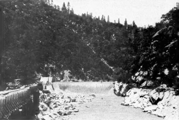 THE DAM ON THE YUBA RIVER, WHENCE THE POWER STARTSALSO WHERE THE SEVEN-MILE FLUME COMMENCES150 MILES FROM OAKLAND, CAL.