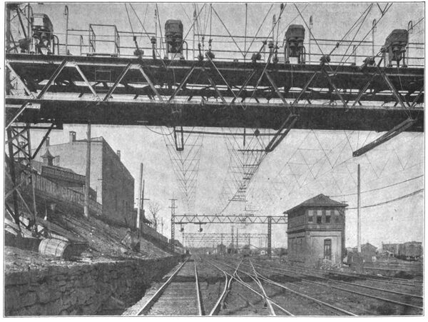 FIG. 18.  DEFLECTOR WIRES IN PLACE BETWEEN THE MAIN TROLLEY AND CROSS-OVER TROLLEY