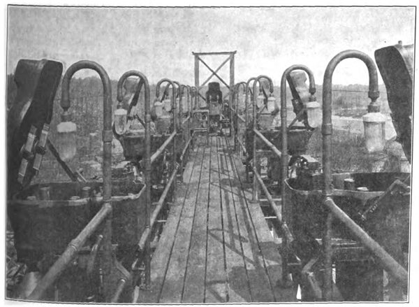 FIG. 5.  VIEW OF PLATFORM ON ANCHOR BRIDGE, SHOWING CIRCUIT BREAKERS ON EITHER SIDE