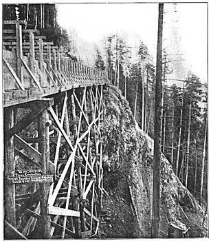 FLUME LINE THROUGH ROCK CANYON OF PUYALLUP.