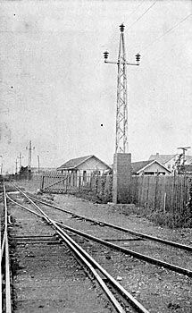 FIG. 30 — Galvanized steel poles on railway