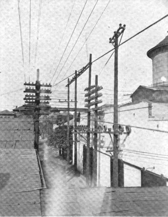 Figure 21 Two, 30,000 Volt Line for No. 3 and No. 1 Entering Fresno Sub. Two, 30,000 Volt Lines Leaving Fresno Sub. for Kerman and Hanford. Behind Iron Doors are the Fire Proof Transformers and Lightning Arrester Cells