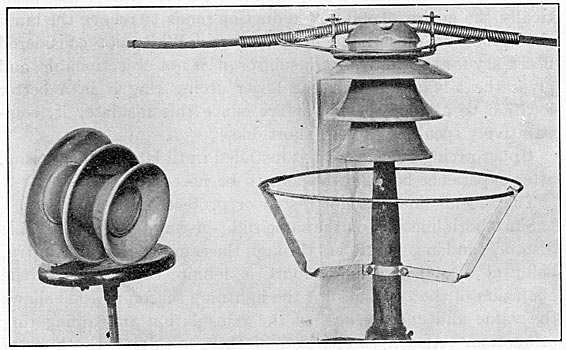 FIG. 12. - New style four-part insulator installed on top wire, 1909.  Also shows method of attaching arcing-ring supports to cylindrical pins.