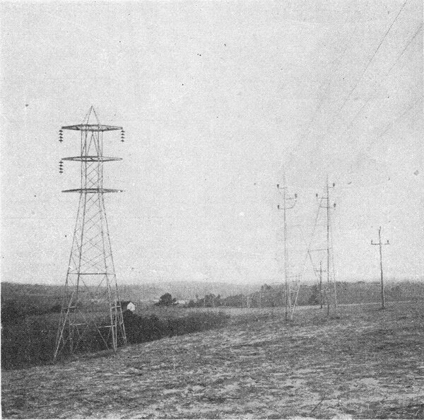 FIG. 14 -- 100,000-VOLT AND 50,000-VOLT TRANSMISSION LINES.