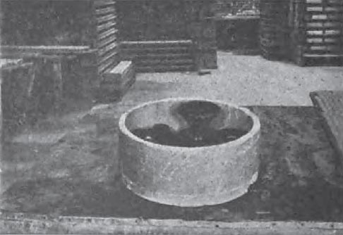 FIG. 3  FIRED INSULATORS IN SAGGER  After drawing from kiln.
