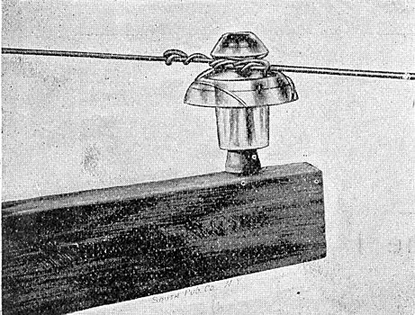 FIG. 13. - ONE OF THE 20,000-VOLT INSULATORS.