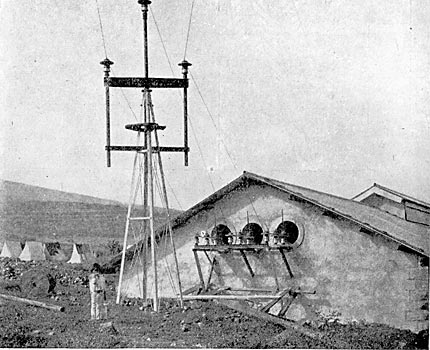 FIG. 36.-- THE FIRST TOWER OF THE TRANSMISSION LINE.