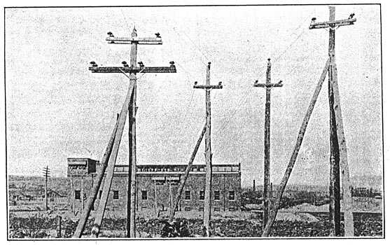 FIG. 13.  WATERBURY SUB-STATION NO. 1, SHOWING INCOMING AND OUTGOING HIGH-TENSION TRANSMISSION LINES.
