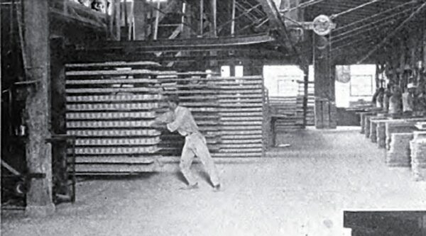 Racks Convey the Green Ware from the Presses to and thru the Dryer