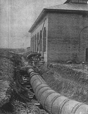 FIG. 2.  THE PIPE LINE ALONG THE SIDE OF THE CANYON.